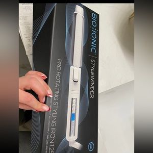 Bio ionic curling iron brand new never used 1.25